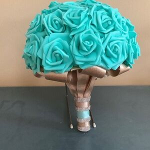 Large bridal bouquet with teal blue real touch roses